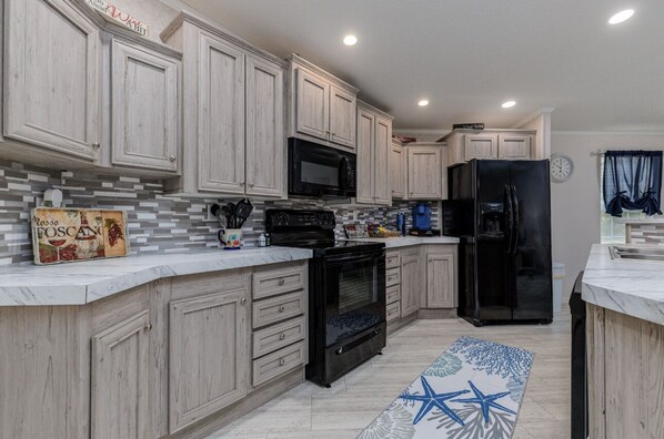 Fridge, microwave, oven, stovetop