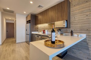 Luxury Apartment, Balcony, City View | Private kitchen | Fridge, microwave, oven, stovetop
