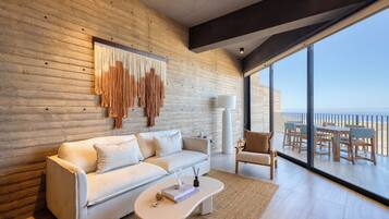 Luxury Apartment, Balcony, City View | Living room | 50-inch flat-screen TV with digital channels