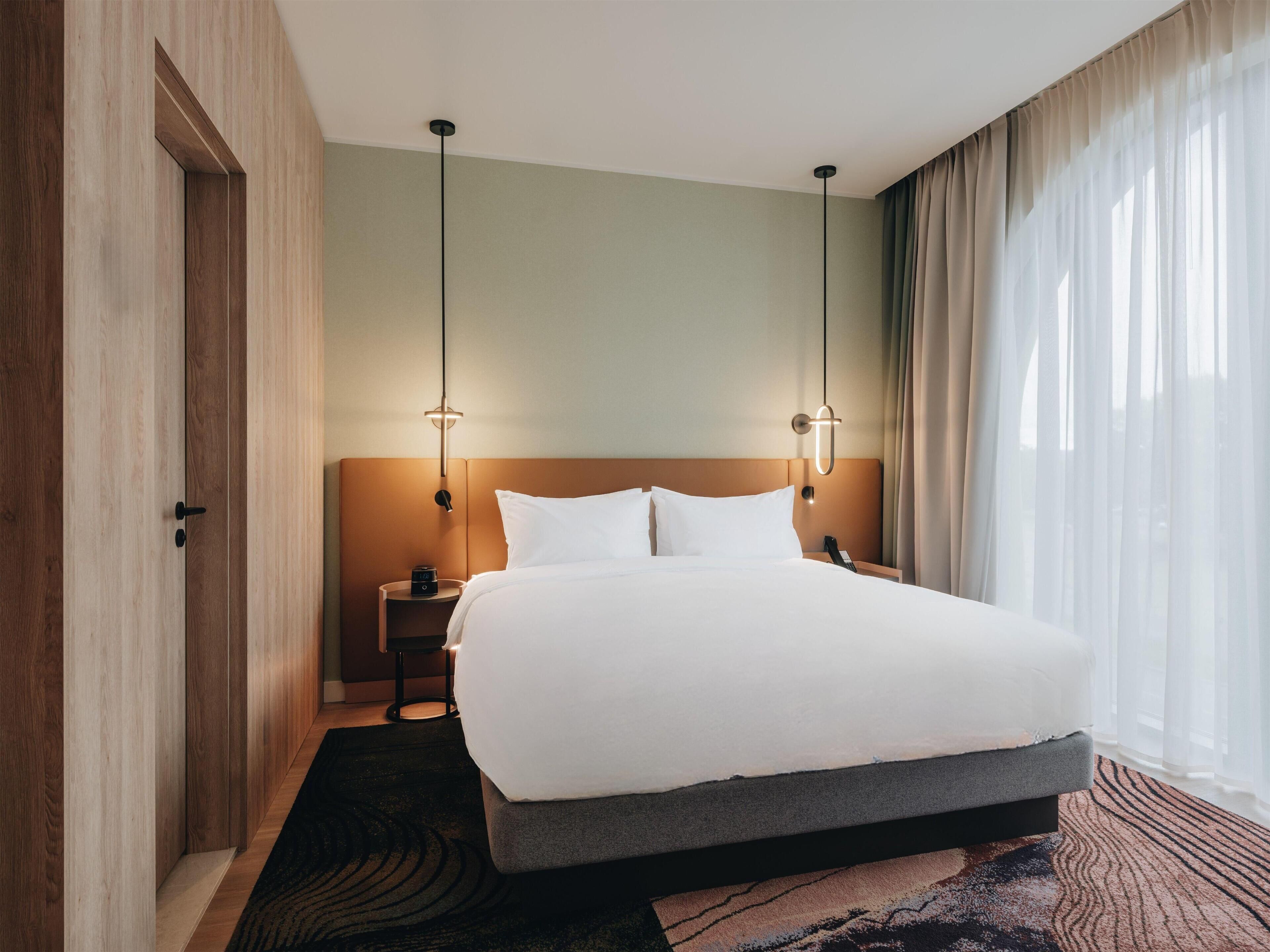 Suite, 1 Bedroom | In-room safe, desk, blackout drapes, soundproofing