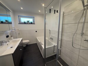 Hair dryer, towels, soap, toilet paper