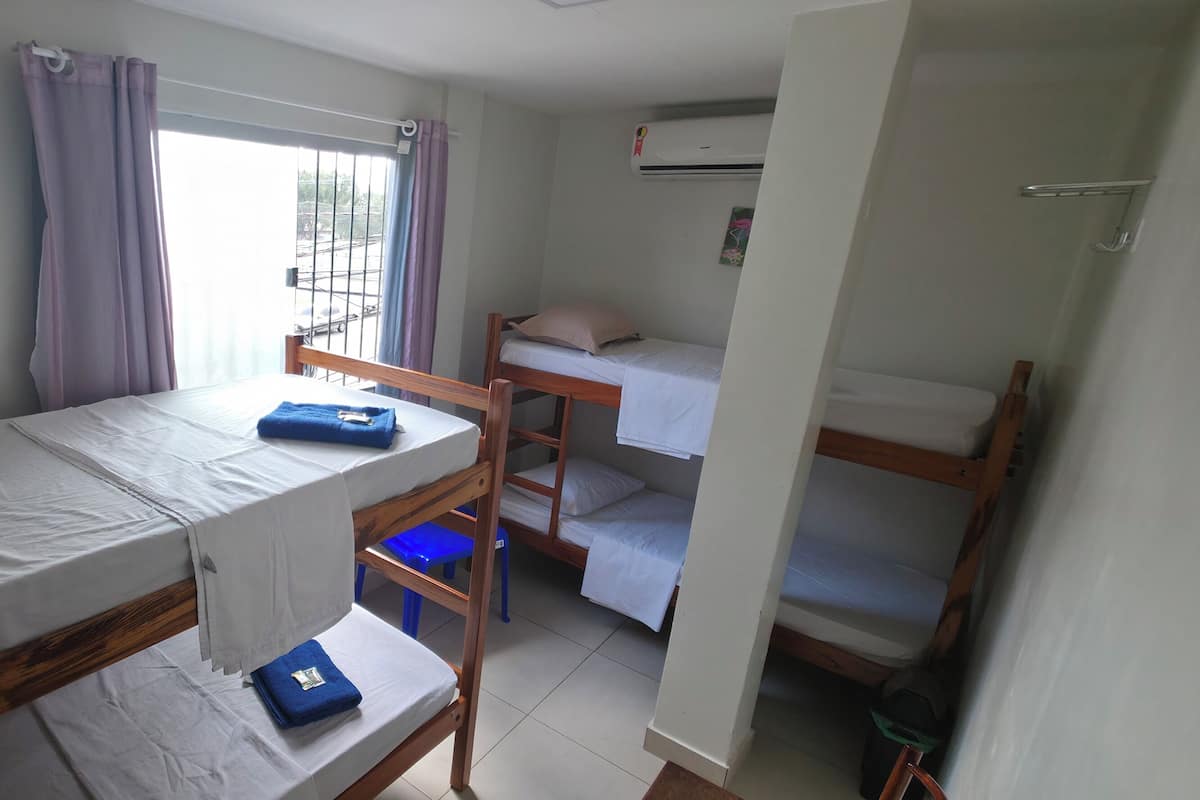 Economy Quadruple Room, City View | Iron/ironing board, free WiFi, bed sheets