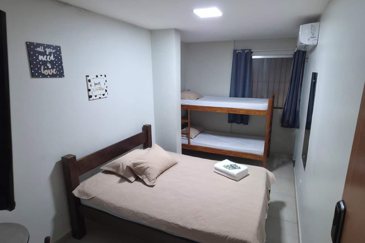 Deluxe Quadruple Room, City View | Iron/ironing board, free WiFi, bed sheets