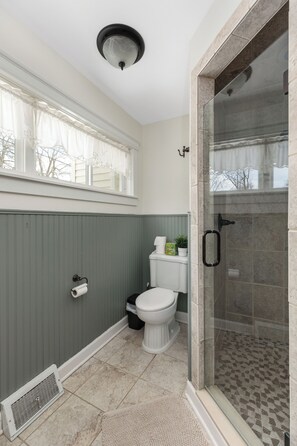 Shower, hair dryer, towels, soap