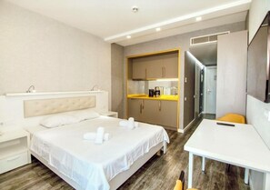 In-room safe, desk, laptop workspace, iron/ironing board