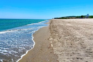 Perto da praia, toalhas de praia 