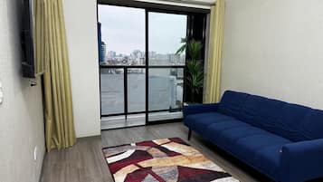 Comfort Apartment, City View | Living area
