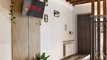 1 habitación, tabla de planchar con plancha, wifi y ropa de cama