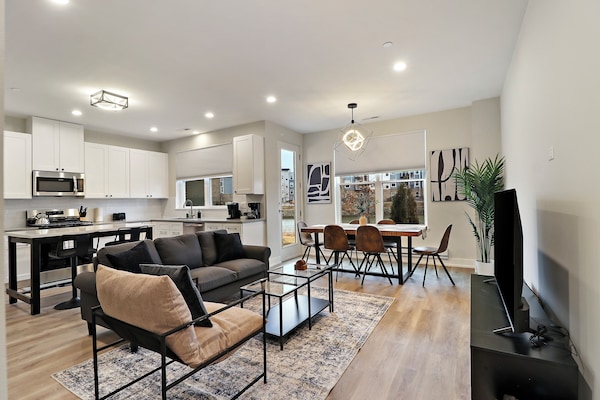 Family Apartment, Multiple Beds, Lake View | Living area | 55-inch Smart TV with digital channels, streaming services