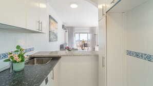 Apartment | Private kitchen - Beachfront Apartment in Empuriabrava With Pool (Castello d'Empuries)