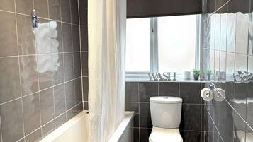Hair dryer, towels, soap, toilet paper