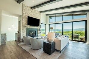 Smart TV, fireplace, books, offices