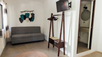 Habitación triple Deluxe, patio, vista al jardín (1) | Wifi gratis