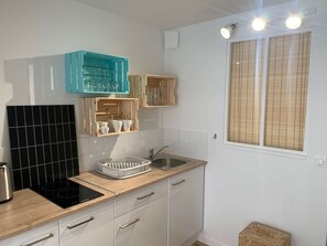 Fridge, toaster, cookware/dishes/utensils