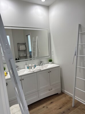 Hair dryer, towels, soap, toilet paper