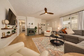 Smart TV, fireplace, ping pong, books