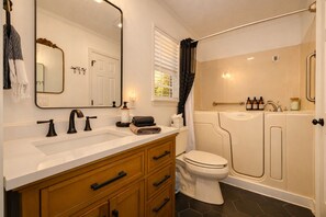 Shower, jetted bath, hair dryer, bidet
