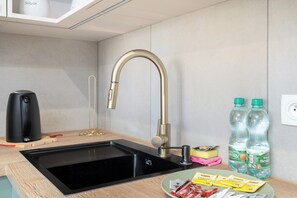 Réfrigérateur, four, plaque de cuisson, lave-vaisselle