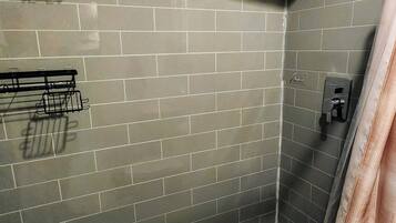 Shower, towels, soap, toilet paper