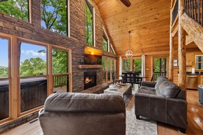 Smart TV, fireplace, books, stereo