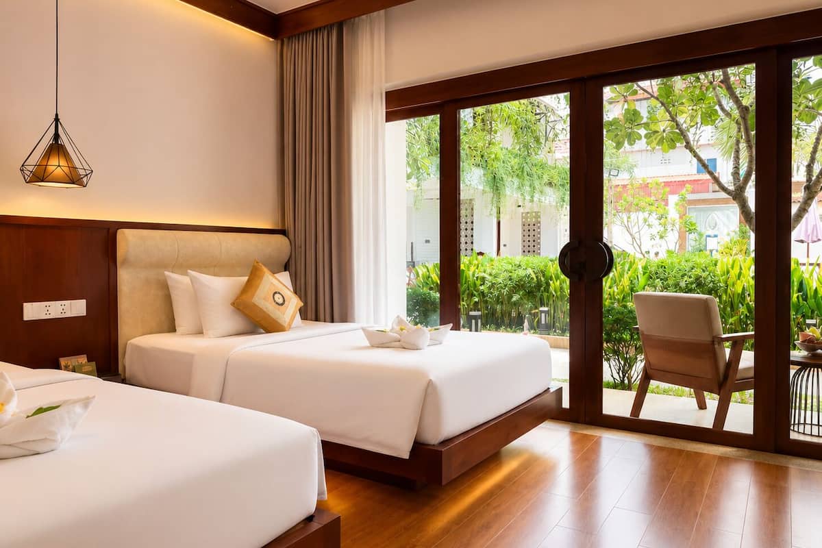 Phòng 2 giường đơn Deluxe | Bộ đồ giường cao cấp, két bảo mật tại phòng, bàn, màn/rèm cản sáng