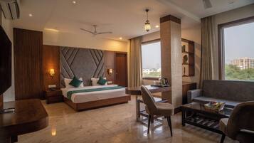 Family Studio Suite, City View | Iron/ironing board, free WiFi