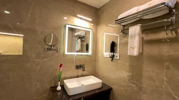 Shower, slippers, towels, soap