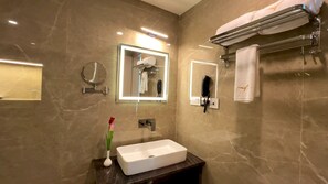 Shower, slippers, towels, soap