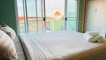 1 bedroom, desk, bed sheets