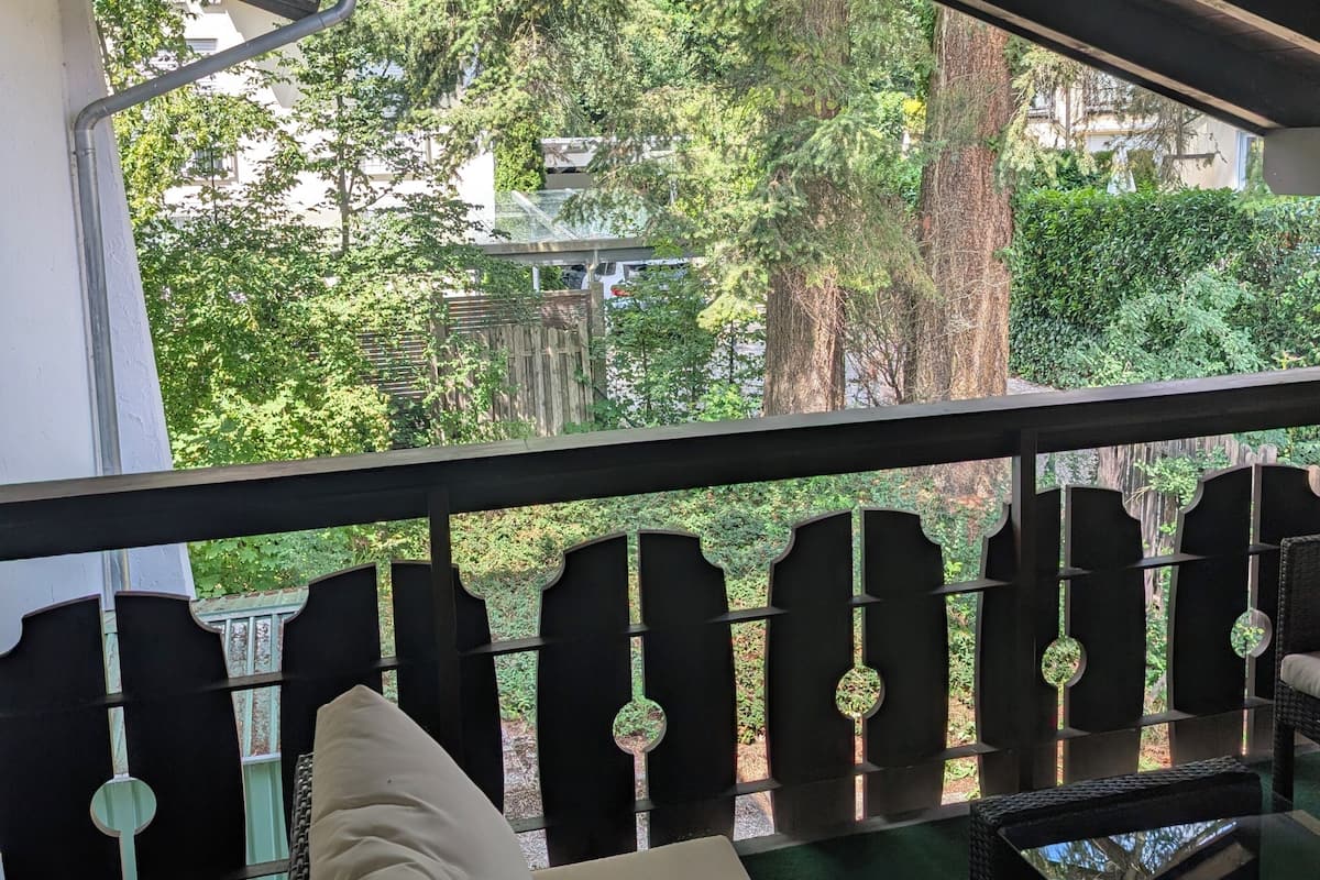 Habitación doble Deluxe de uso individual, para no fumadores, balcón | Vista al jardín