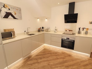 Fridge, microwave, cookware/dishes/utensils - Lakes View Apartment 1 (Carnforth)