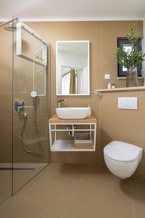 Hair dryer, towels, soap, toilet paper