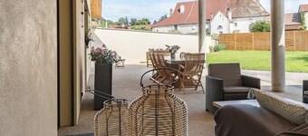 Modern, bright lodging in Gy with spacious living area, garden, and children's games
