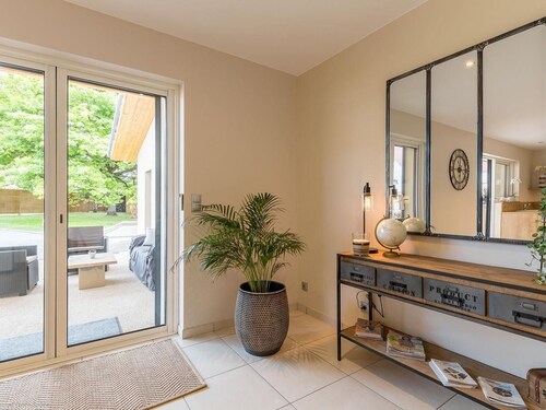 Modern, bright lodging in Gy with spacious living area, garden, and children's games