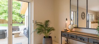 Modern, bright lodging in Gy with spacious living area, garden, and children's games