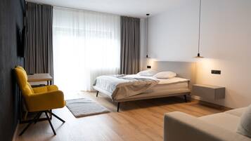 Quarto triplo luxo | Escrivaninha, Wi-Fi de cortesia, roupa de cama