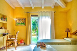 A room with yellow walls, a wooden ceiling, a bed, a chair, a lamp, a window with curtains, and a painting. - Silene Luxury Villa with Pool and Large Garden in Castelvetrano, Selinunte, Sicily (Castelvetrano)