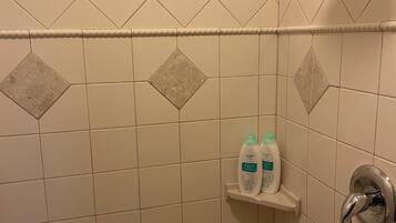 Shower, jetted tub, hair dryer, towels