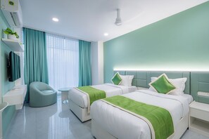 Superior Twin Room | Desk, laptop workspace, blackout drapes, soundproofing - Grace Suites (Ernakulam)