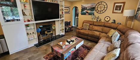 TV, fireplace, books, offices