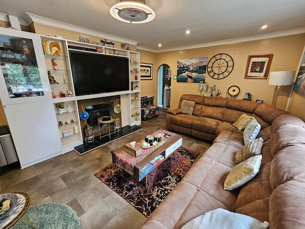 TV, fireplace, books, offices