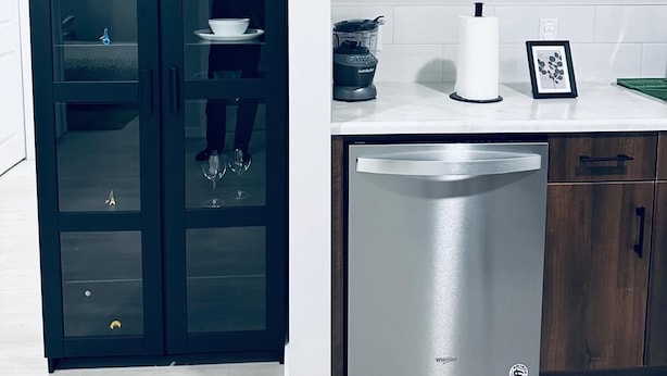 Cozinha moderna com armário escuro, lava-louças e cafeteira na bancada.