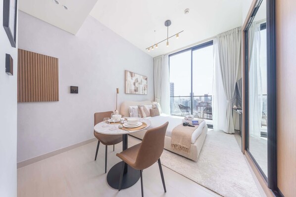 Interior - Free housekeeping visits during your stay - StayShort - Chic Studio in JVC Sleeps 2 with Balcony and Pool (Jumeirah Village Circle)