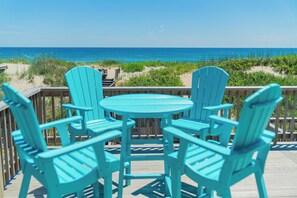 Outdoor dining - Salty 7 – Oceanfront 8BR Retreat w/ Pool, Game Room & Breathtaking Views (Nags Head)