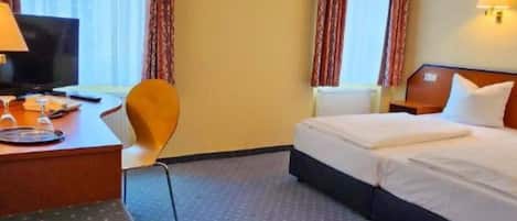 Deluxe Double Room | Desk, laptop workspace, blackout drapes, iron/ironing board