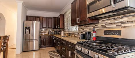 Fridge, microwave, coffee/tea maker, toaster