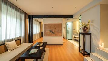 Deluxe Double Room, Garden View | Living area | 55-inch LCD TV with digital channels