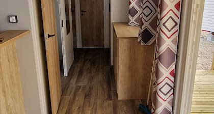 A deux kilomĂštres de l'ocean et du lac, grand mobilhome neuf Ă Lacanau Ocean