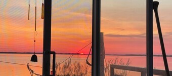 Blooming Point home on Tracadie Bay with sunset views of the National Park Dunes