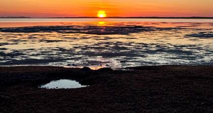 Blooming Point home on Tracadie Bay with sunset views of the National Park Dunes